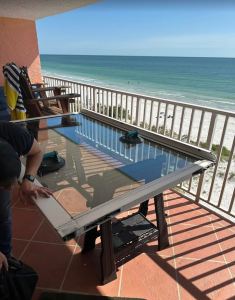 Harvey’s Sliding Door Repair technician replacing sliding door rollers in Lutz, FL